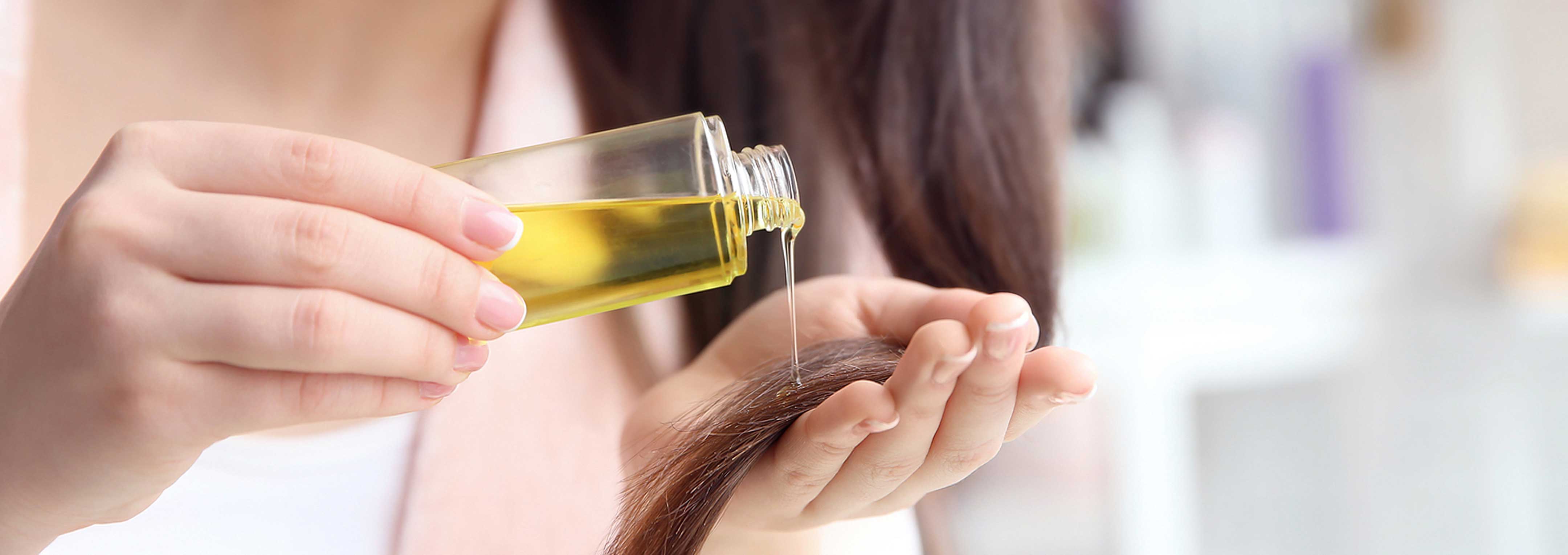 শীতে চুলের যত্নে তেল