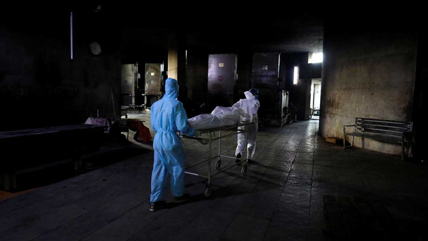 2021-05-28T093038Z_1274357099_RC2ODN9EYPRZ_RTRMADP_3_HEALTH-CORONAVIRUS-INDIA-DEATHS.jpg