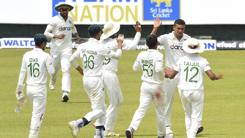 Bangladesh's Taskin Ahmed (2R) celebrates after dismissing Pathum Nissanka.jpg