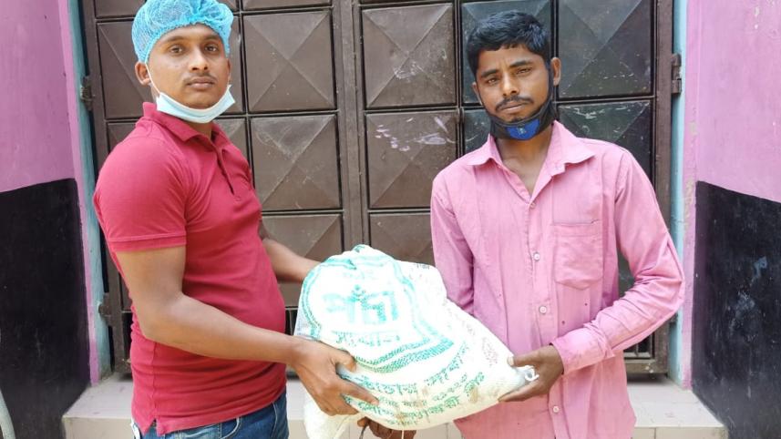 Bbaria Food distribution on behalf of Law Minister.jpg