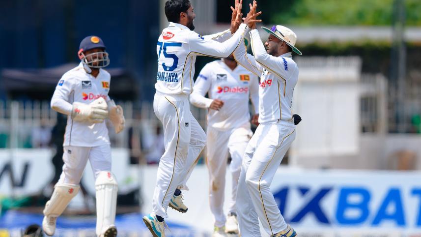 copy_of_dhananjaya_de_silva_and_pavan_rathnayake_celebrates_mominul_haque_s_wicket_vk99646.jpg
