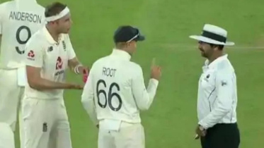 Joe-Root-with-umpire.jpg