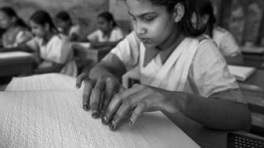 blind-girl-reading-braille.jpg