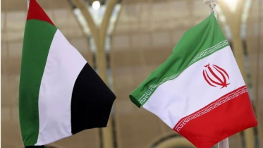 আরব আমিরাত ও ইরানের পতাকা। ফাইল ছবি: এএফপি