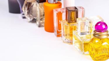 glass-bottles-with-different-perfumes-on-a-white-background.jpeg