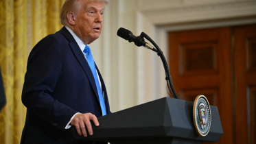 হোয়াইট হাউসে সংবাদ সম্মেলনে বক্তব্য রাখছেন ট্রাম্প। ছবি: এএফপি