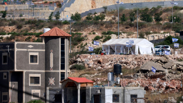 অধিকৃত পশ্চিম তীরের ফিলিস্তিনি গ্রাম ব্রুকিনে অবৈধ ইসরায়েলি বসতি। ফাইল ছবি: এএফপি (২৩ মে, ২০২৫) 