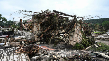 টেক্সাসের বন্যায় ক্ষতিগ্রস্ত একটি বাড়ি। ছবি: এএফপি