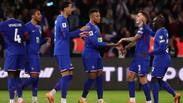 France's forward Kylian Mbappe (C)