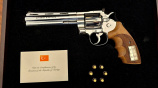 NATO-SUMMIT-REVOLVERS